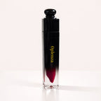Oplenza Signature Ultra Shine Lip Gloss in 13 Royale, showing the tube on a neutral background, best vegan tinted lip gloss