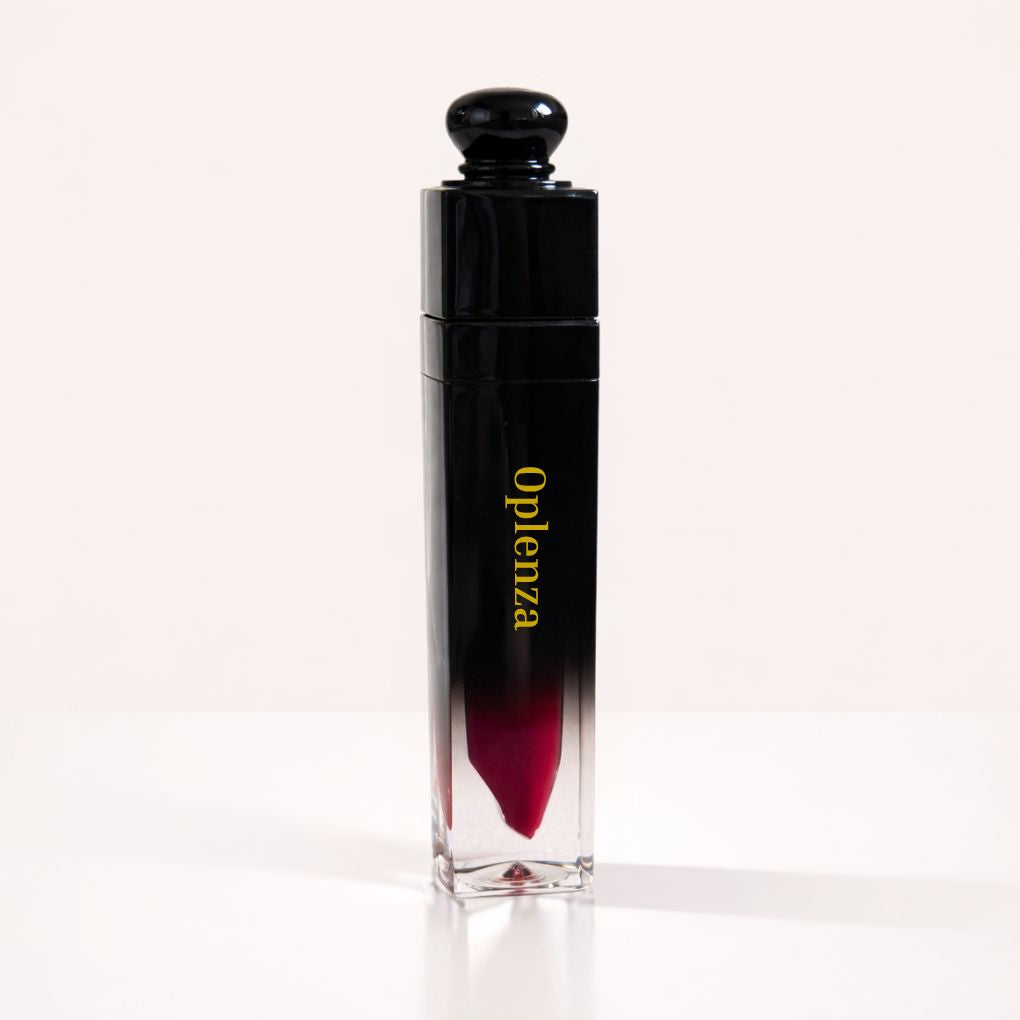 Oplenza Signature Ultra Shine Lip Gloss in 13 Royale, showing the tube on a neutral background, best vegan tinted lip gloss