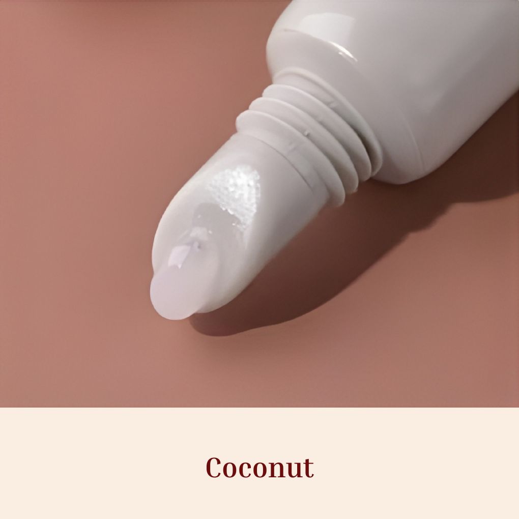 Oplenza Obsession Glass Lip Gloss applicator close-up, shade Coconut