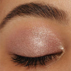 Woman showcasing Oplenza Easy Glide Eyeshadow Stick in shade Dazzling- Easy Glide Eyeshadow Stick applied on eyelid. Effortless makeup routines