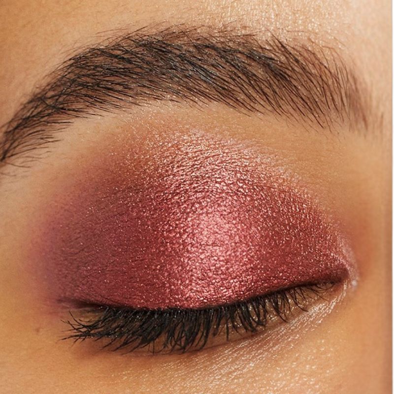 Woman wearing Oplenza Easy Glide Eyeshadow Stick in shade Flame-best multi-use eye stick