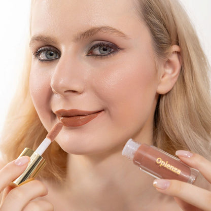 A woman wearing and showcasing the best cruelty-free, vegan, shiny and hydrating lip gloss in the Latte shade.
