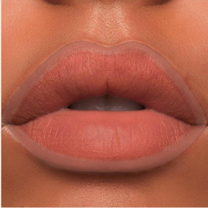 A close-up of the Oplenza Velvet Whisper Lip Liner effect on a woman's lips in the shade Desert Mirage