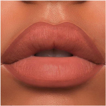 A close-up of the Oplenza Velvet Whisper Lip Liner effect on a woman's lips in the shade Sahara Dusk