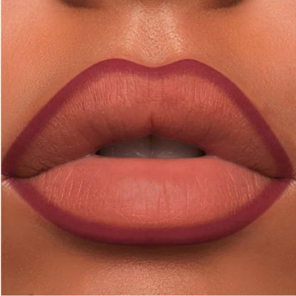 A close-up of the Oplenza Velvet Whisper Lip Liner effect on a woman's lips in the shade Scarlet Temptation