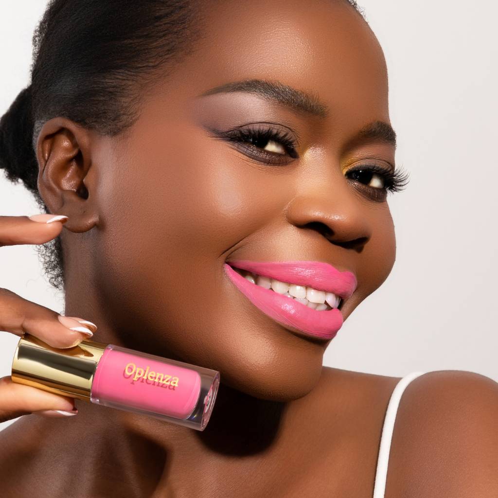 Model wearing and showcasing the vegan, cruelty-free Oplenza matte liquid lipstick in the shade Lush