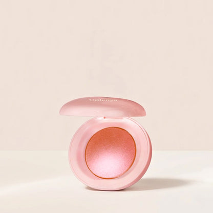 Oplenza Luminous Pressed Powder Blush in shade Mood-Best Luminous Blush on a beige background