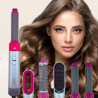 Woman with styled hair and hair styling tools including a hair straightener, brush hair dryer, volumizing brush, and curlers in Soft Taupe