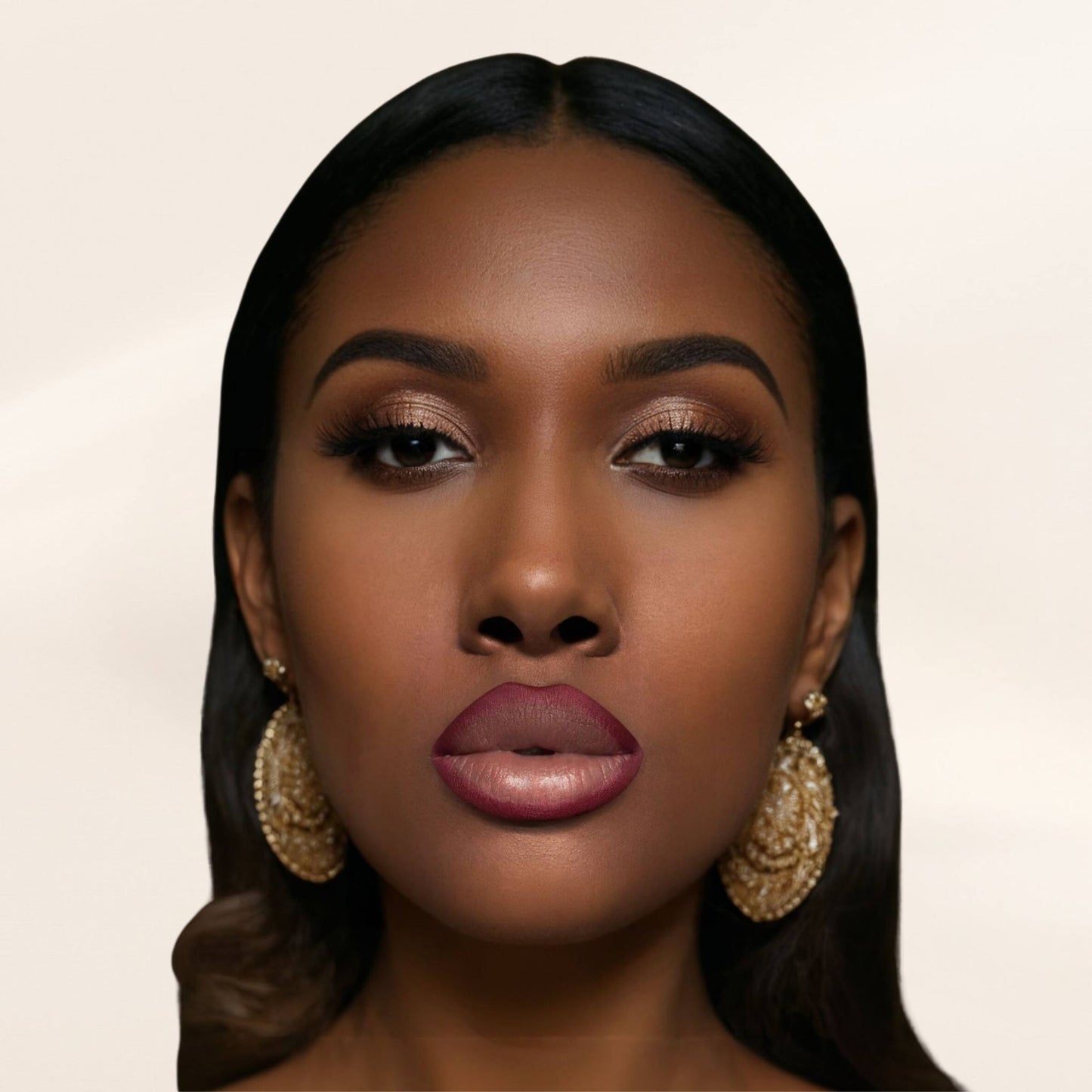 A woman wearing Oplenza Velvet Whisper Lip Liner in shade Bordeaux Seduction on her lips