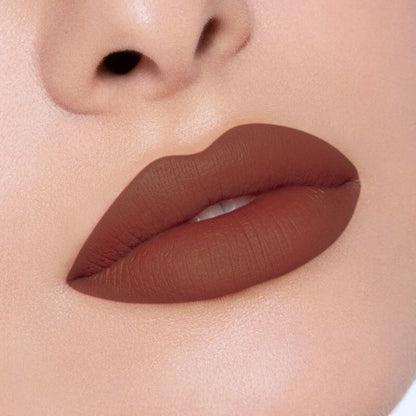 Close-up of the best creamy and moist-matte lipstick applied on lips in shade 13 Ground Rules