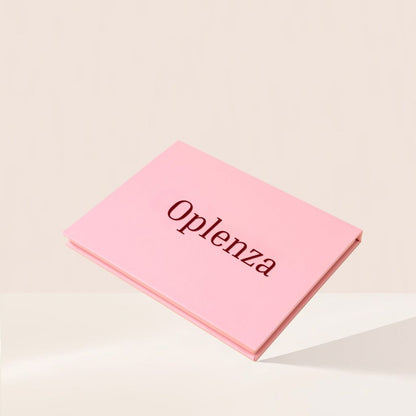 Oplenza Signature Shades Palette-eyeshadow palette on a beige background-Solara Flare, Radiant Ritual, Soft Seduction, Aurora Rush, Ocean Tide