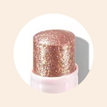 Close-up of Oplenza Crystal Jelly Glitter Stick in shade Sparkle Surge-Multi-use crystal glaze stick for eyes, lips, cheeks, nose, cupid's bow.