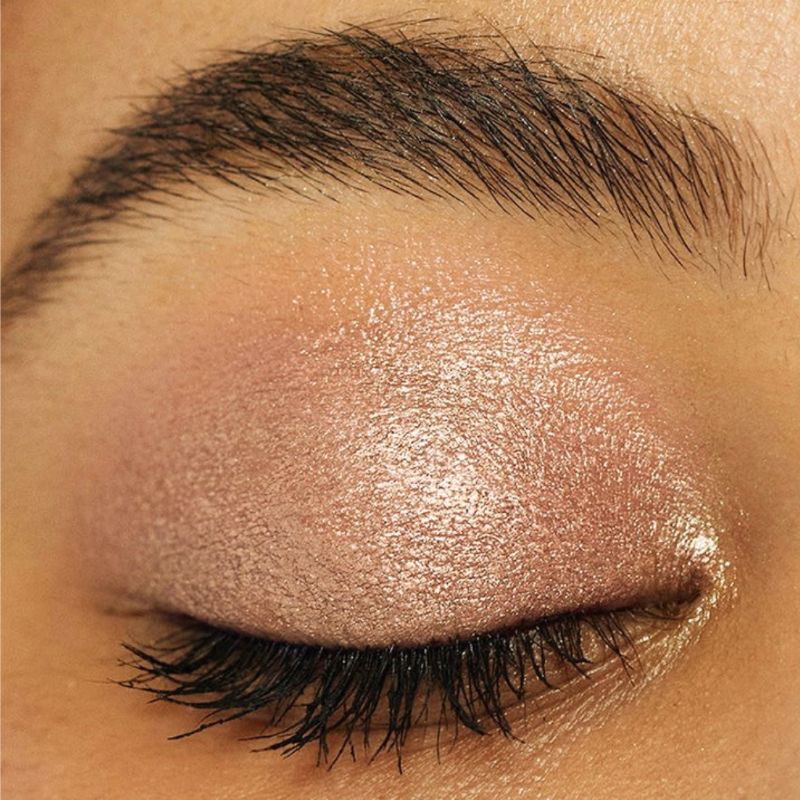 Woman showcasing Oplenza Easy Glide Eyeshadow Stick in shade Sparkling- creamy eyeshadow stick, best make-up shadow stick. 