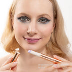 Model wearing Oplenza Hydrating Shimmer Lip Balm in Sugar with luminous shimmer finish