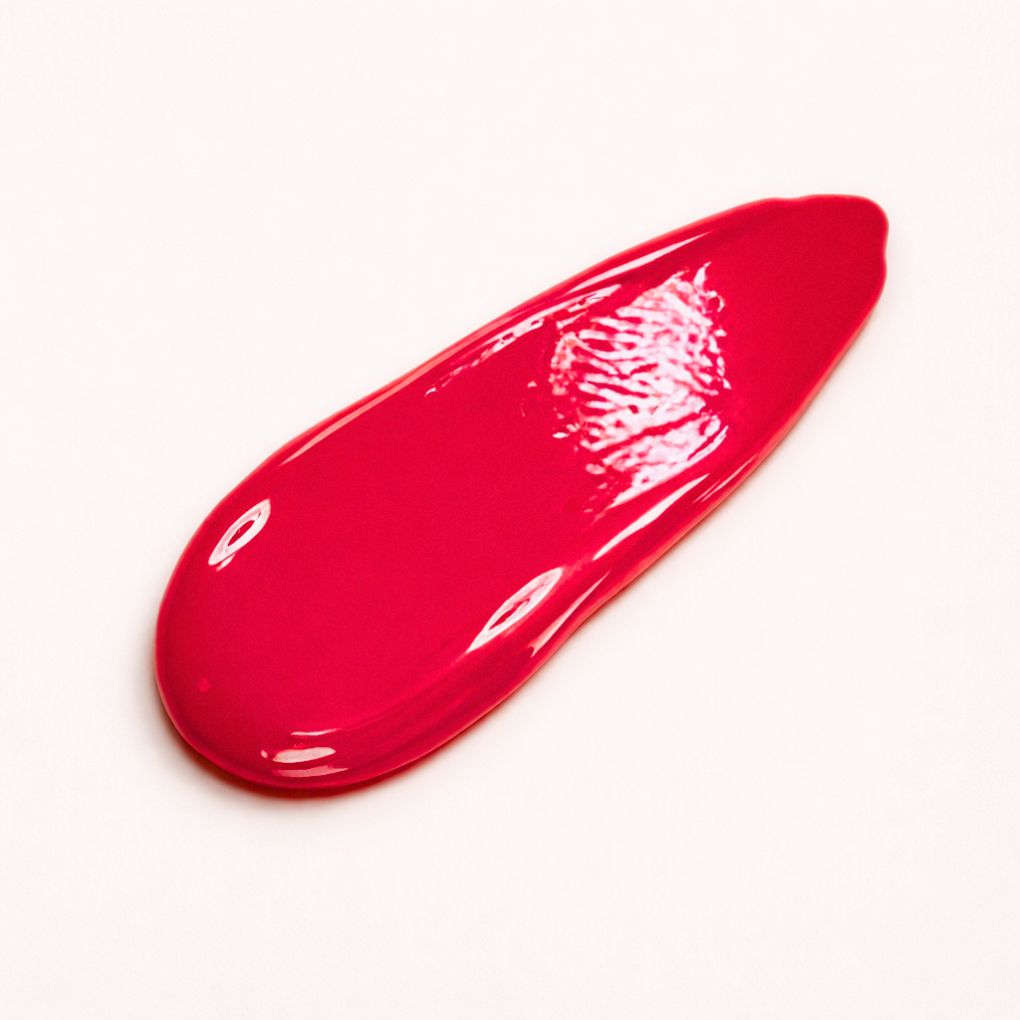Swatch of Oplenza Signature Ultra Shine Lip Gloss in shade The Queen - best long lasting lip gloss.