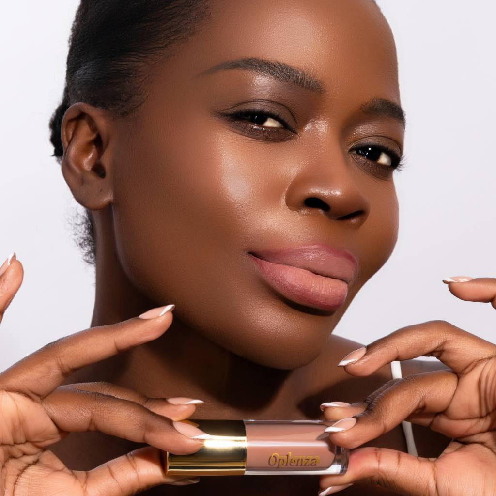 Model wearing and showcasing the vegan, cruelty-free Oplenza matte liquid lipstick in the shade Veil.
