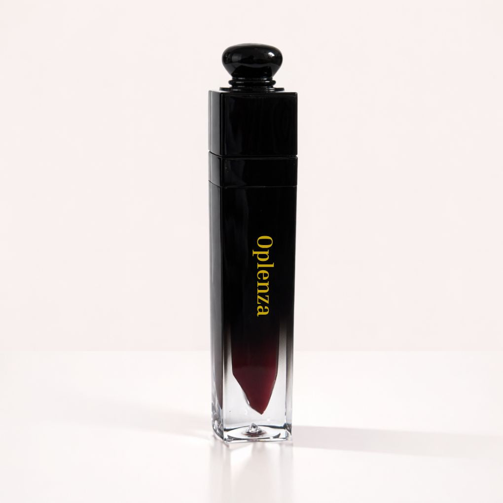 Oplenza Signature Ultra Shine Lip Gloss in Zuri, showing the tube on a neutral background, best vegan tinted lip gloss